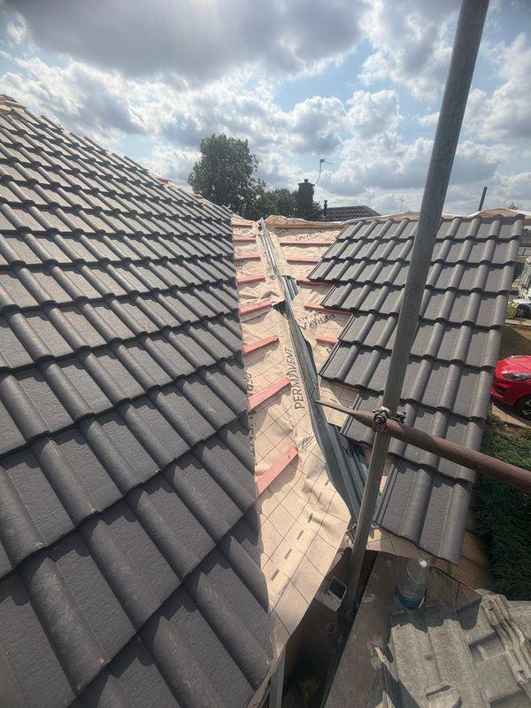 Hip tiles on a re-roof