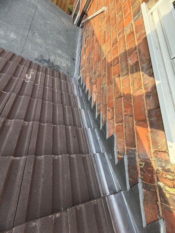 Lead abutment flashing