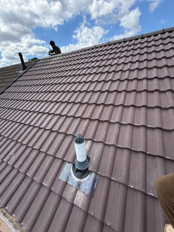 New tiles around a roof vent