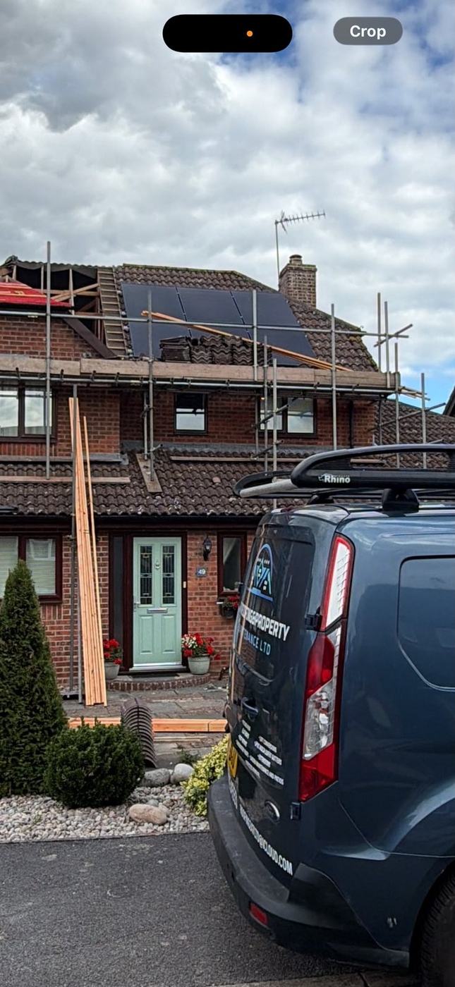 The 247 Roofing van at a job